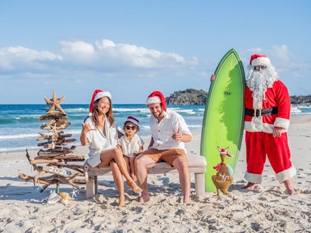 Santa on the beach with family